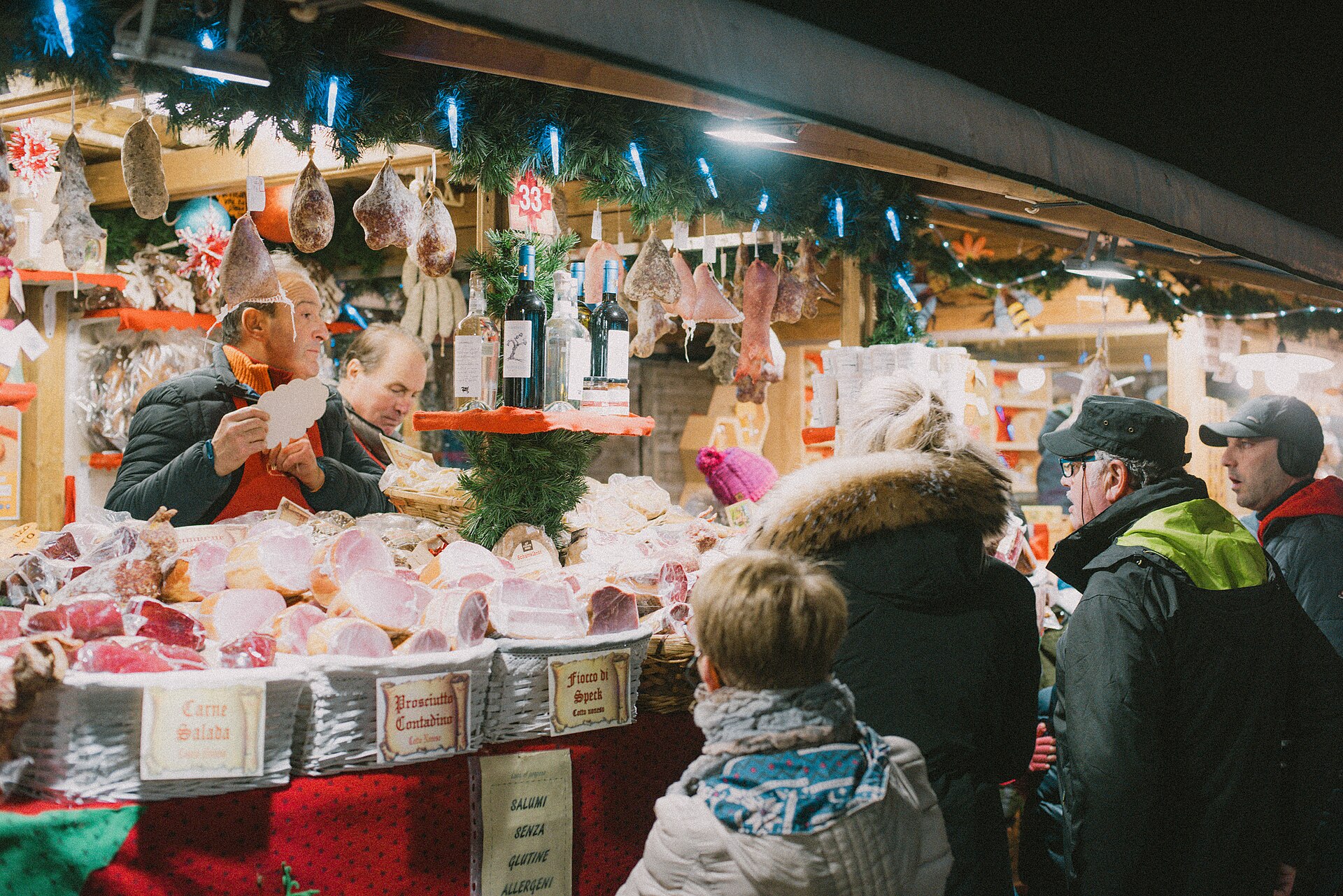 A stall selling local specialities at the Trento Christmas market