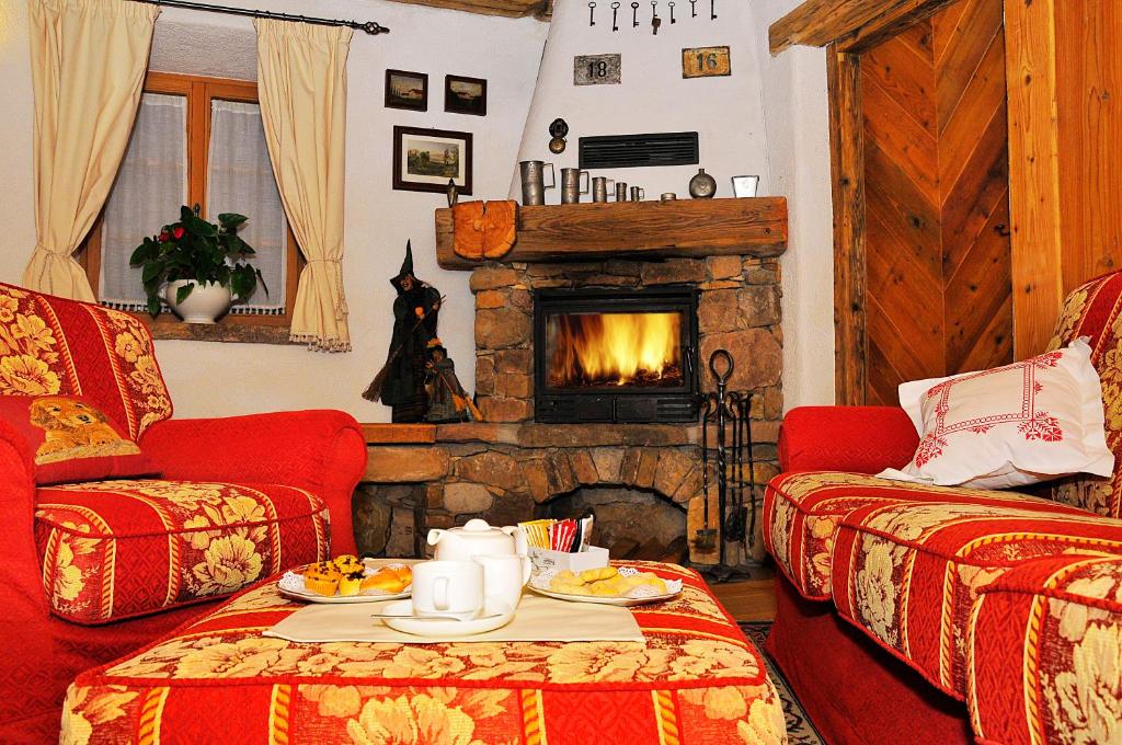 Stube con camino acceso al Maso Franceschella, Ville di Fiemme